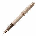 Pluma estilográfica beige con detalles dorados